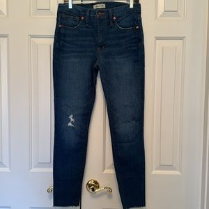 Madewell midrise skinny jeans, size 28. Raw hem, distressed knee, like new